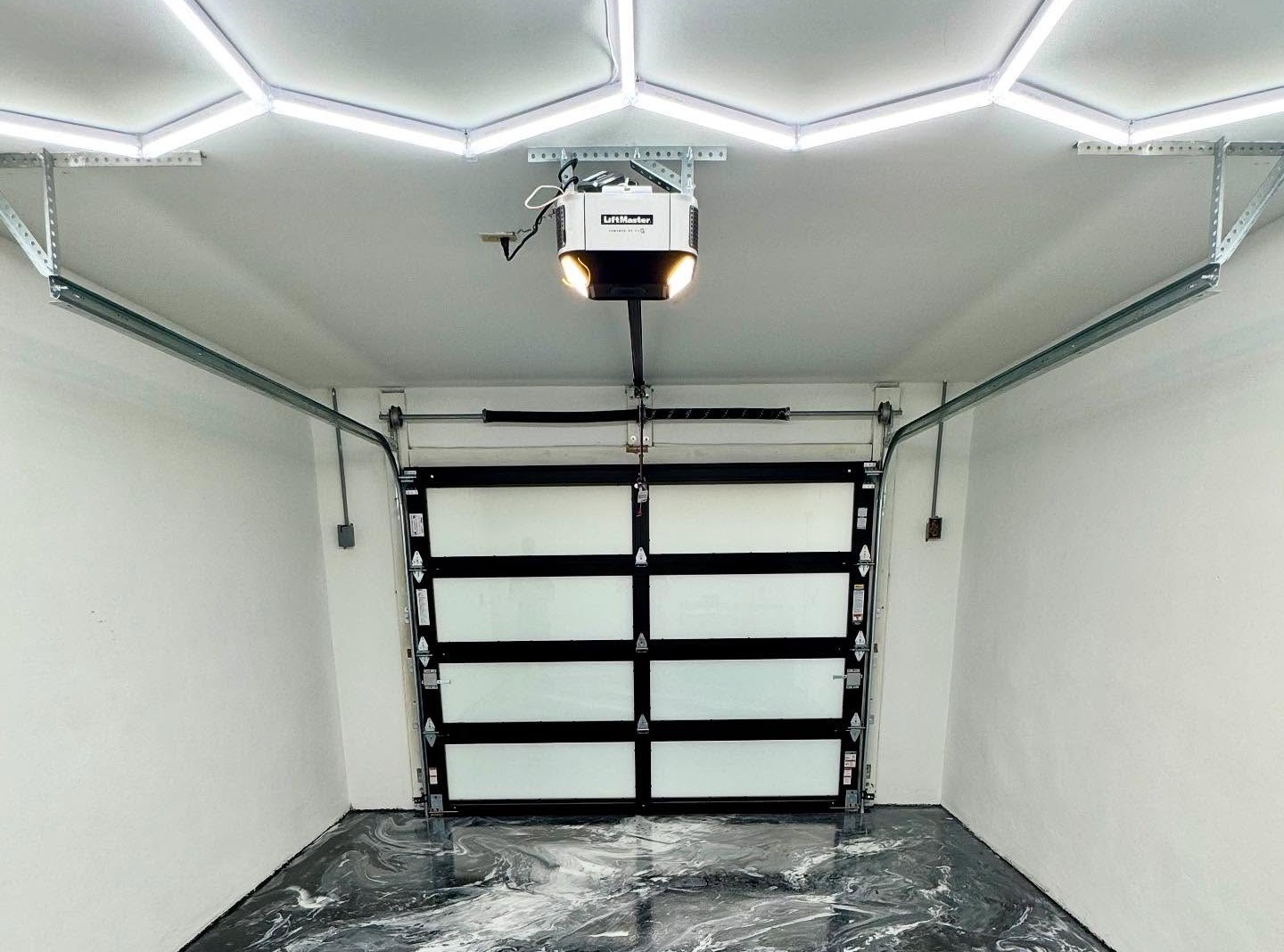 Modern garage with geometric ceiling lights