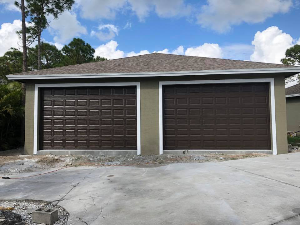 Residential garage with concrete driveway