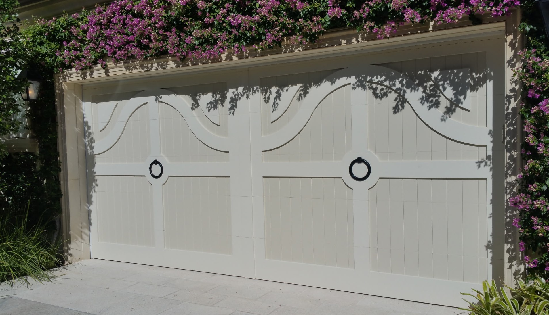 Double garage door with flowers